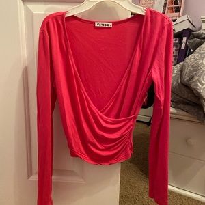 Deep cut wrap long sleeve top